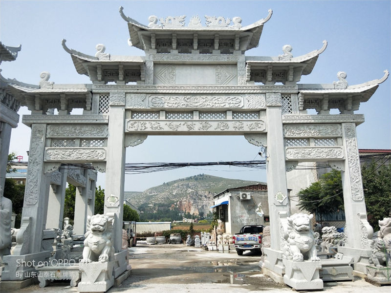 農村三門五樓石牌坊圖片